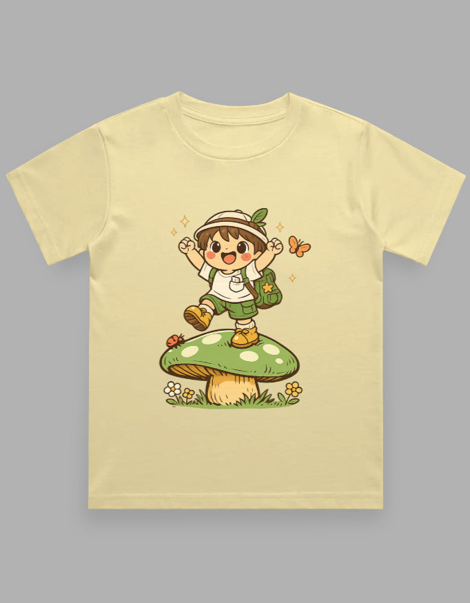 Children's t-shirt with a cartoon character on a mushroom and grass design against a gray background